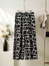 Women's Fashion Solid Color Short Sleeve Shirt And Printed Skirt Set